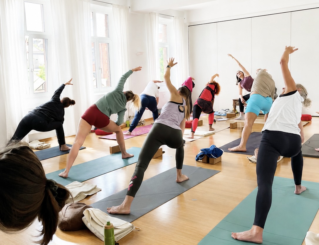 über 50 Kurse die Woche - Yoga Stunde